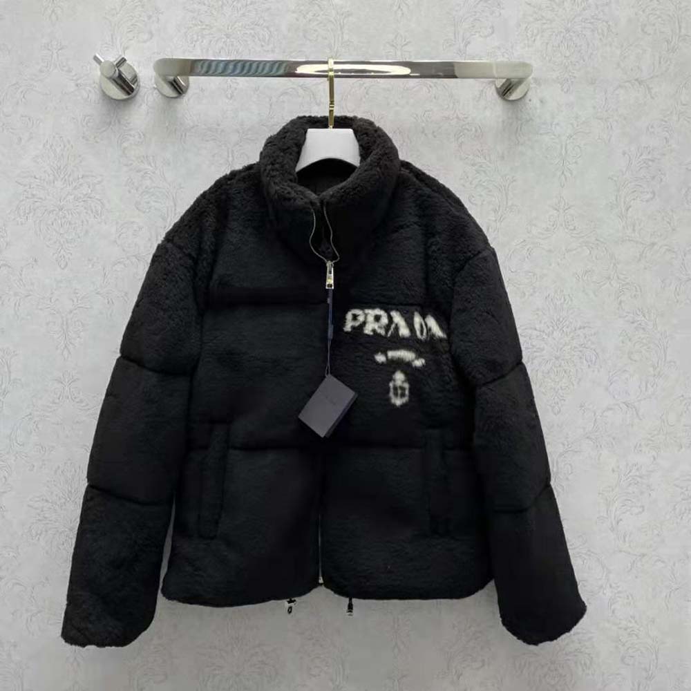 Close-up detail of shearling material on Prada Women Jacket Stands Out for the Delicate Touch of Shearling Jacket-Black