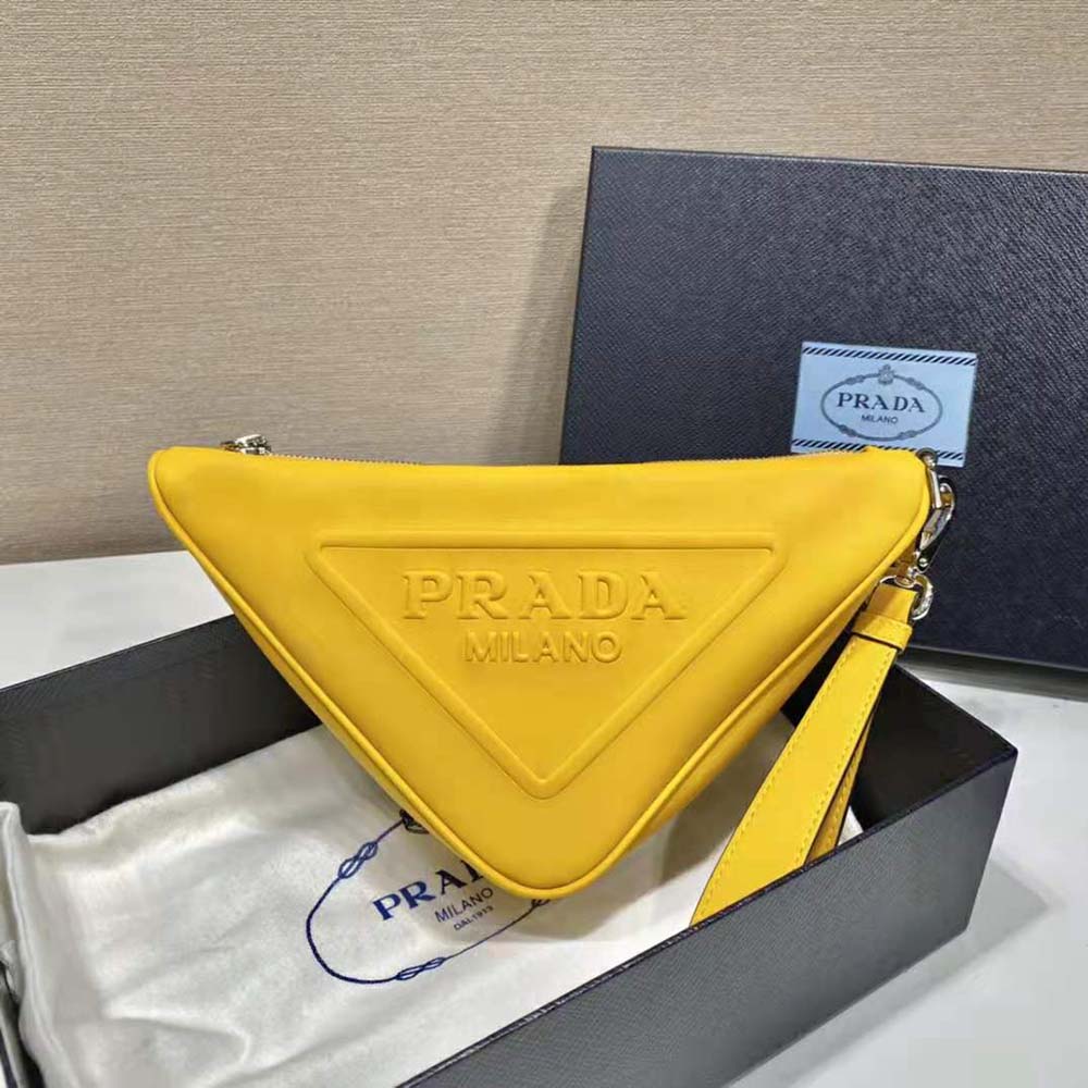 Close-up on silver-tone triangle logo of Prada Leather Triangle Pouch