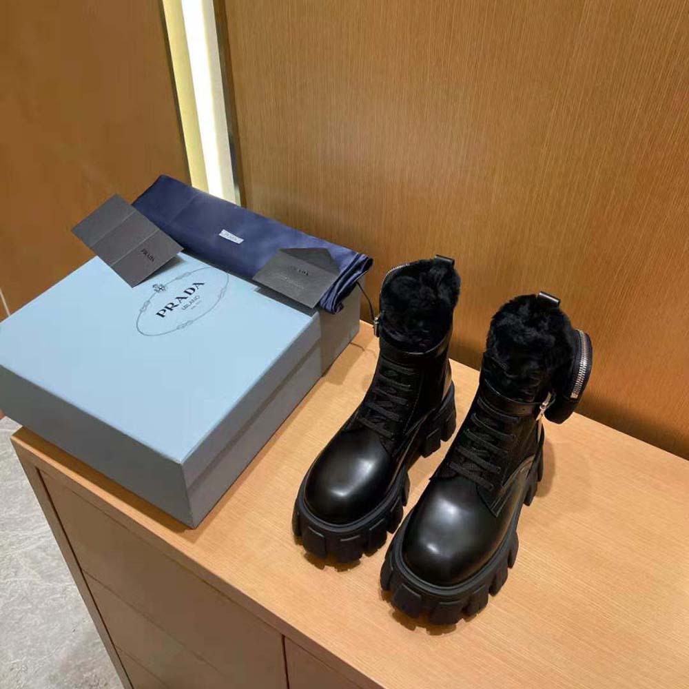 Close-up on signature chunky sole of Prada Women Monolith biker boots