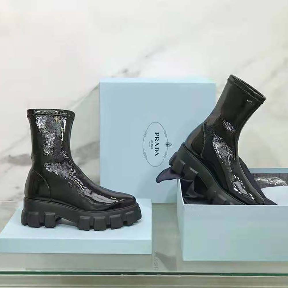 Sole detail showing the chunky rubber tread of Prada Women Monolith booties