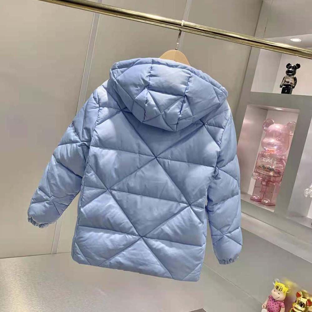 Side angle highlighting oversized silhouette of Prada Women Re-Nylon jacket