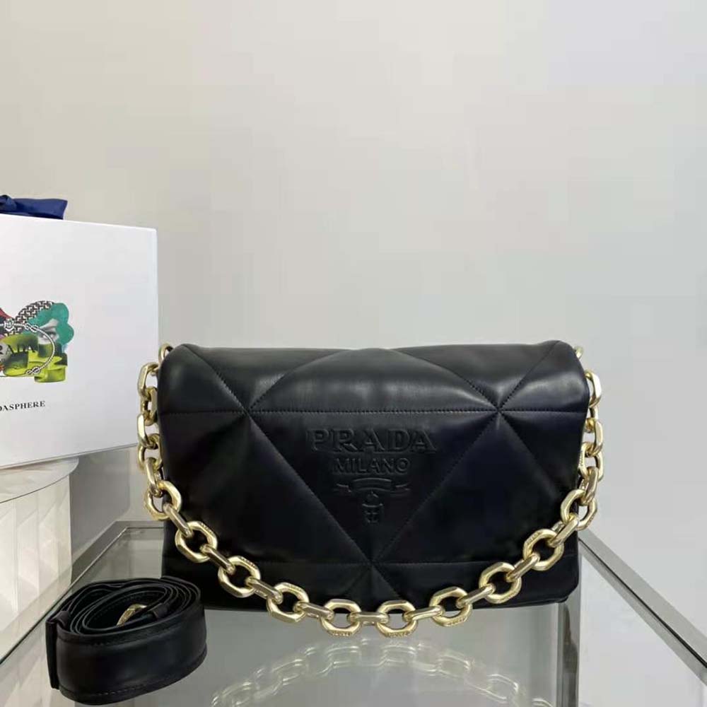 Close-up of padded nappa leather texture on Prada shoulder bag
