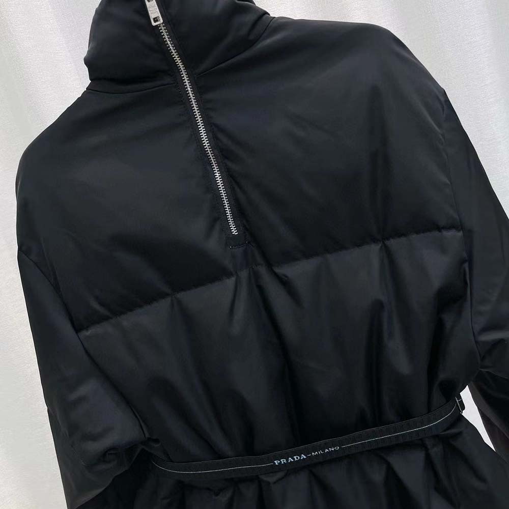 Side angle showing silhouette of Prada Women Re-Nylon Gabardine Down Coat-Black
