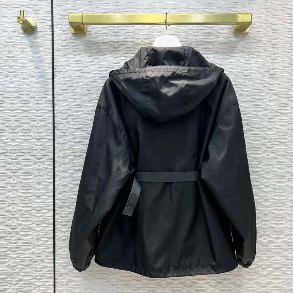 Side angle showcasing hood and pouch detail on Prada Women Re-Nylon Blouson