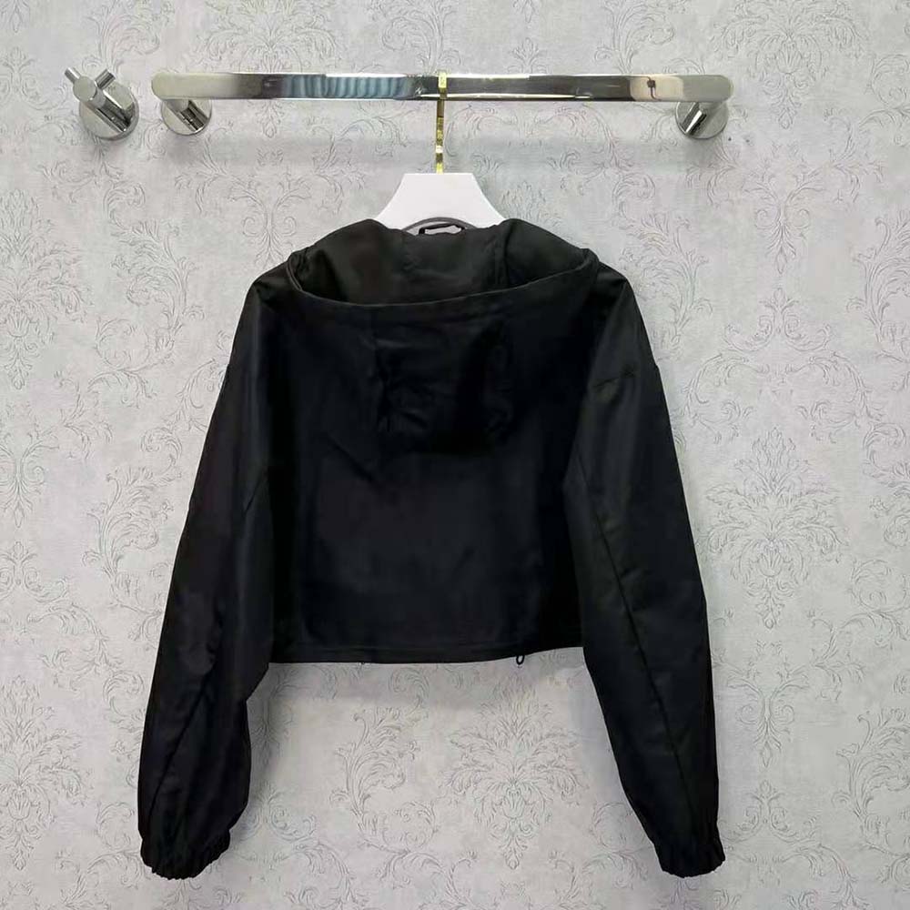 Side profile of Prada Women Technical Silk Shirt-Black highlighting silhouette