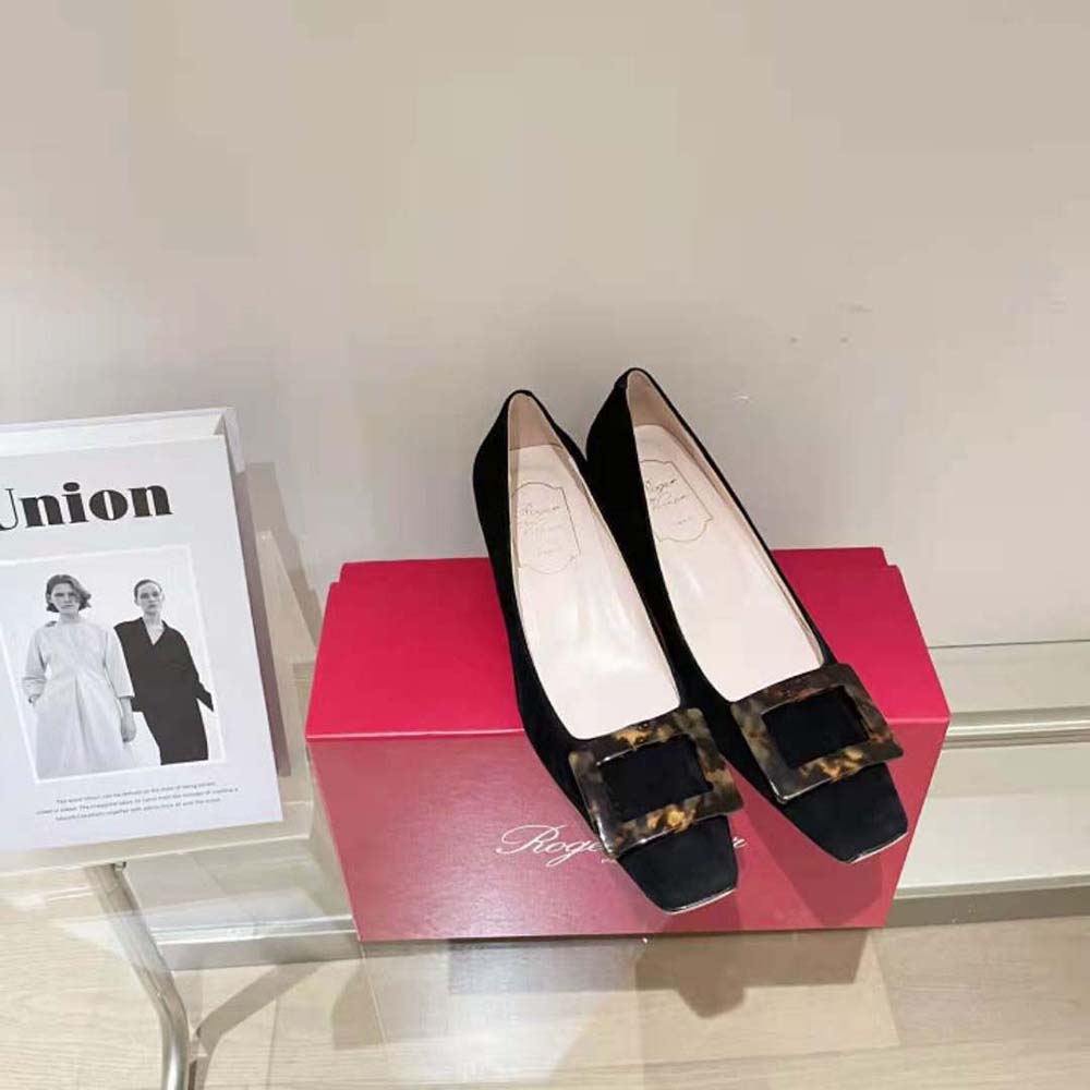 Rear angle showing heel and silhouette of Belle Vivier Turtle Buckle Pumps