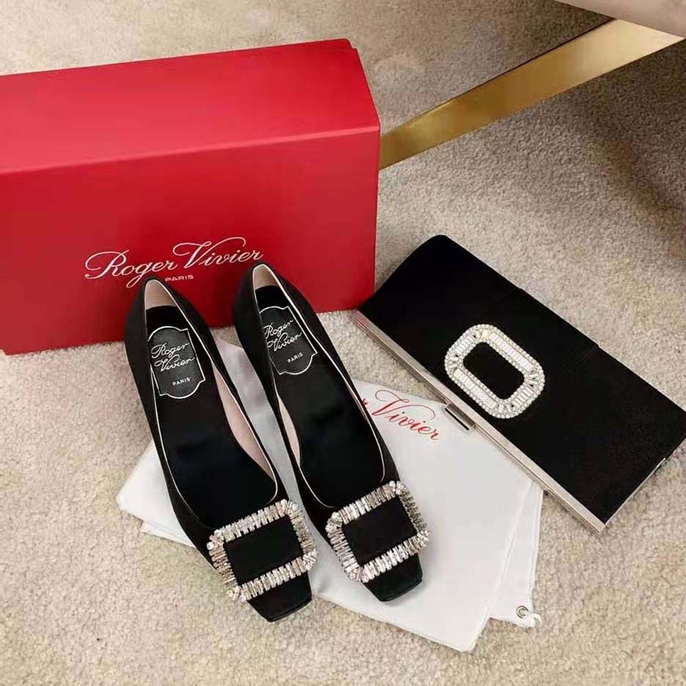 Close-up of crystal buckle detail on Roger Vivier Women Trompette Satin Pumps