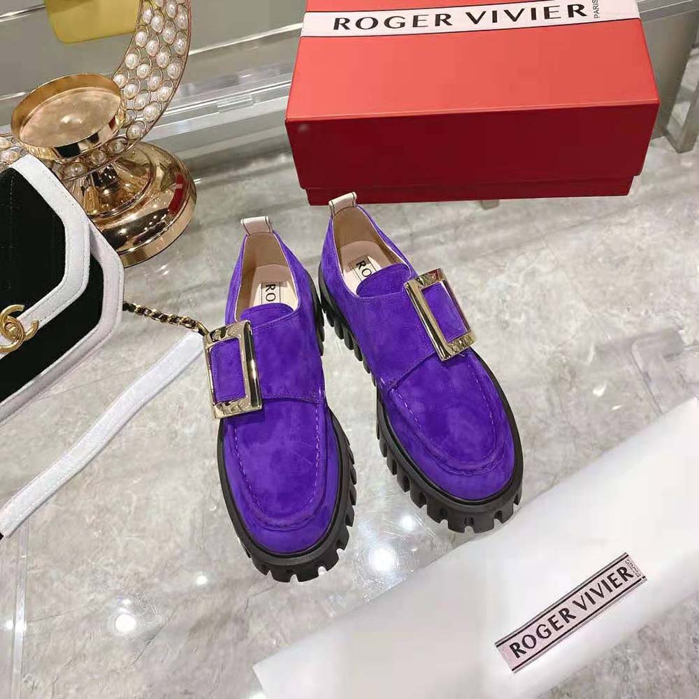 Close-up of metal buckle detail on Roger Vivier Viv’ Go-Thick loafers
