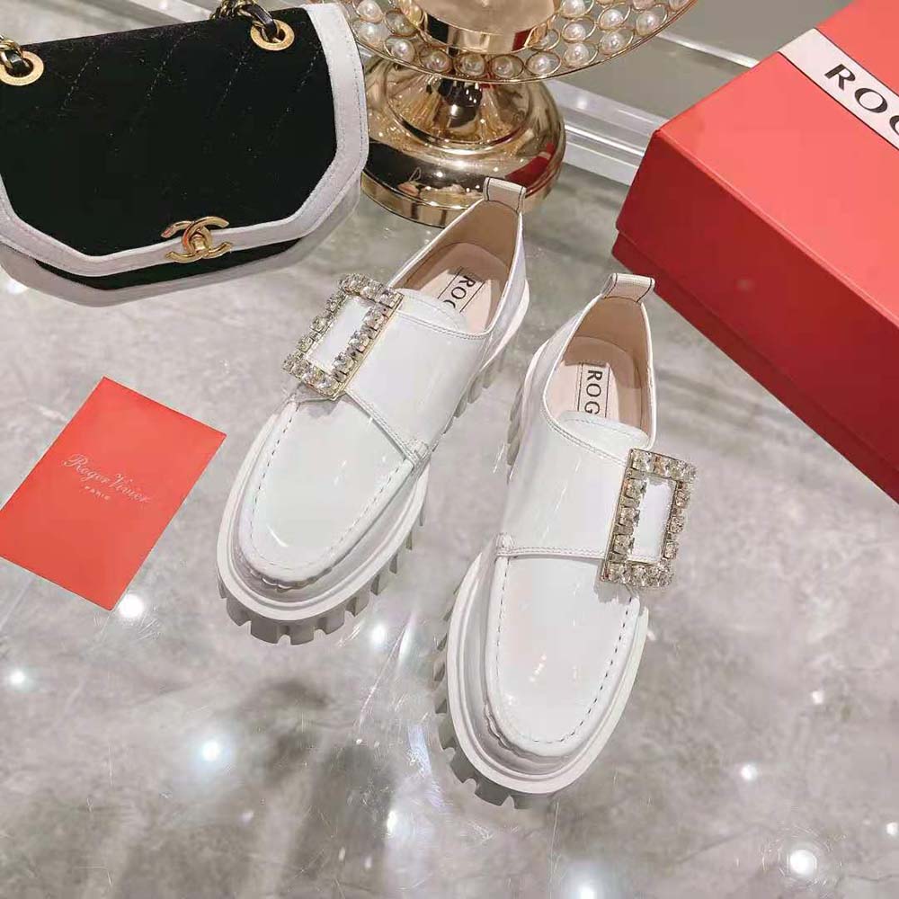 Close-up of sparkling strass buckle on Roger Vivier Viv’ Go-Thick Loafers