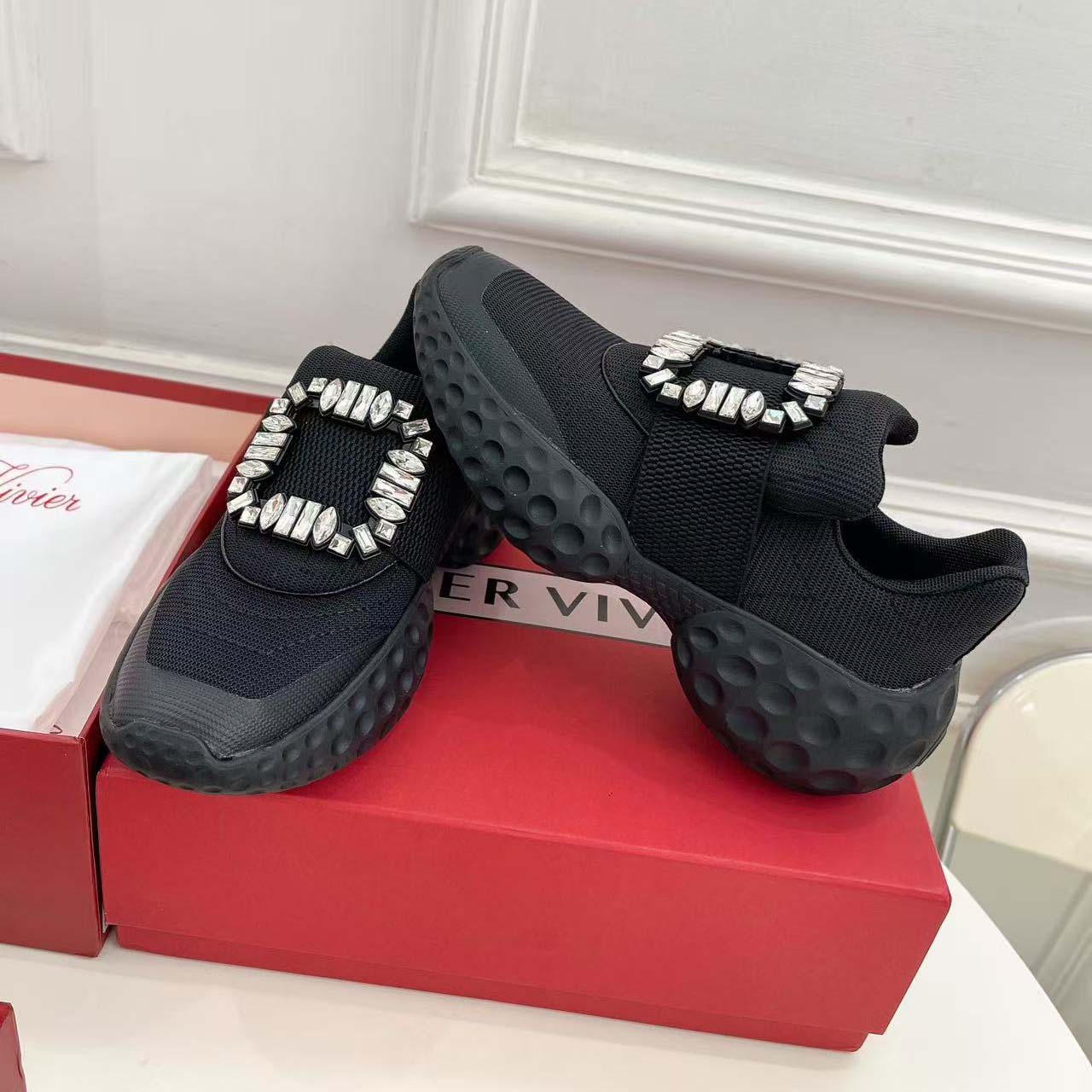 Top-down angle showing silhouette of Roger Vivier Women Viv Run Light Strass Buckle Sneakers