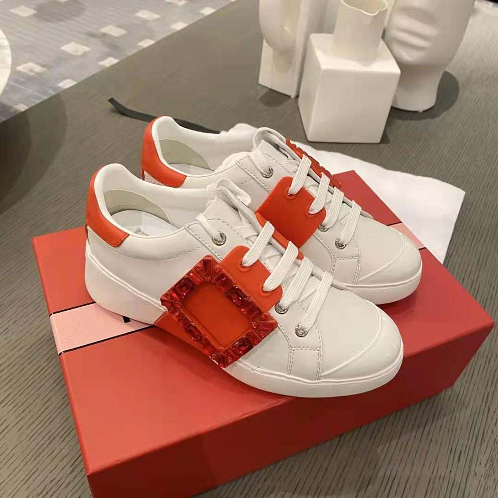Top angle showing red leather texture on Roger Vivier Viv Skate Sneakers