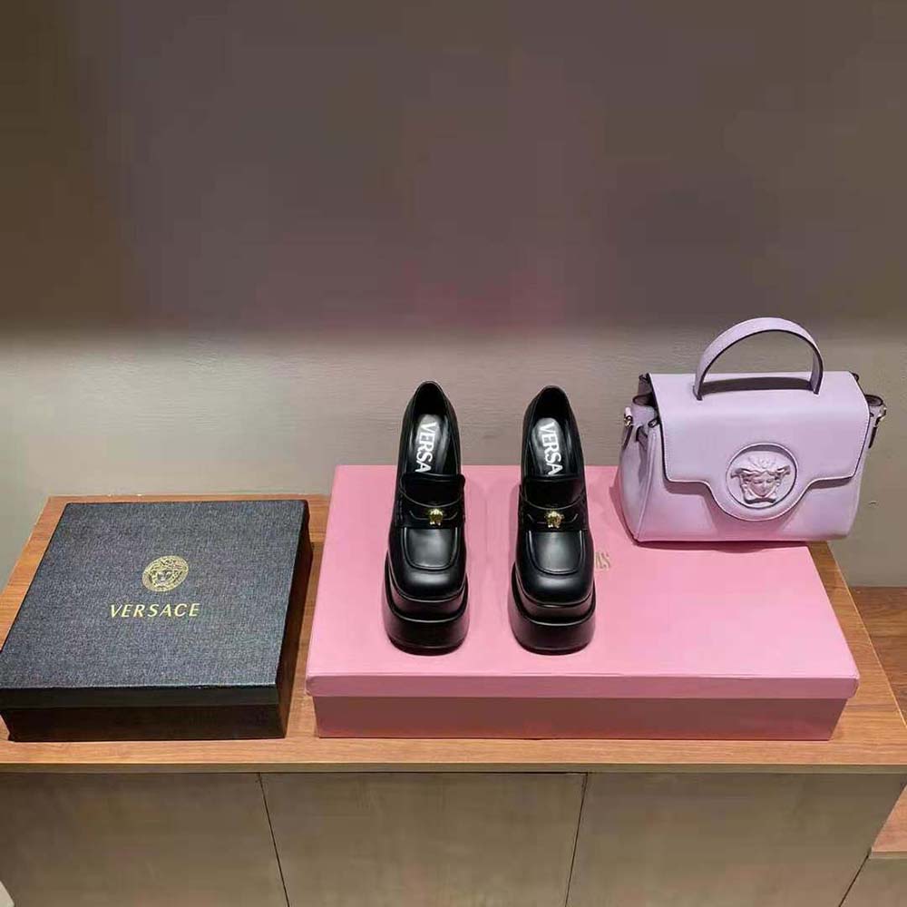 Close-up of intreccio weave and gold Medusa hardware on Versace platform loafers
