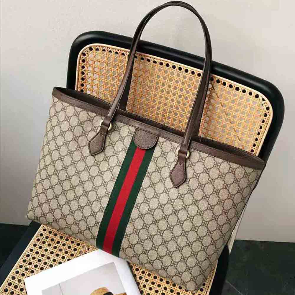 Side angle showing structured silhouette of Balenciaga Women Hacker Medium Tote Bag