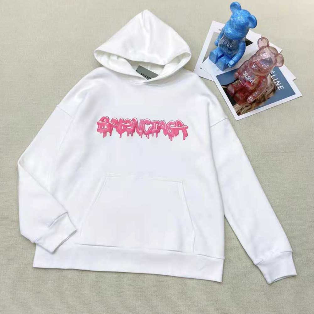 Close-up of heavy fleece texture and pink accents on Balenciaga hoodie