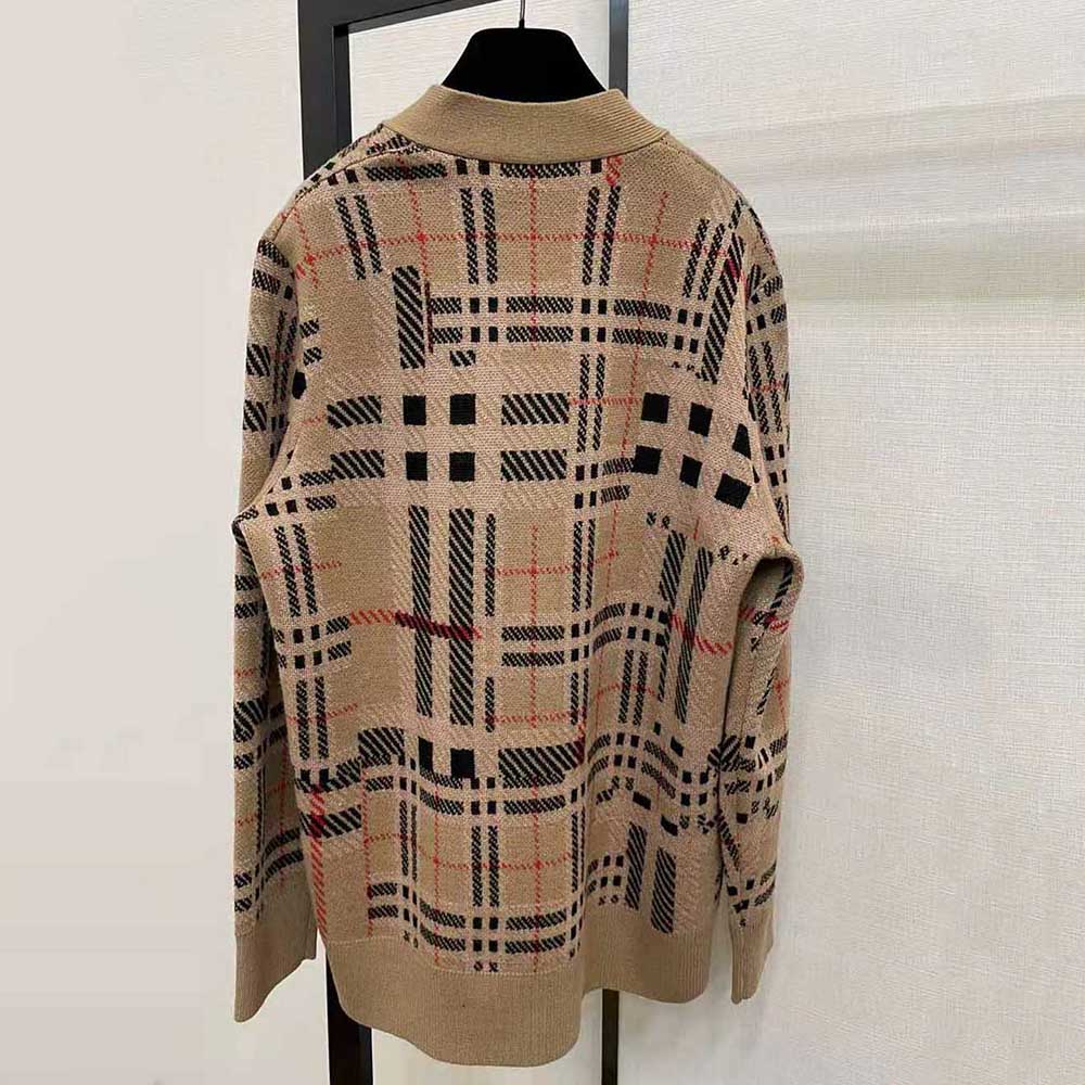 Detail of branded buttons on Burberry Women Check Cashmere Jacquard Cardigan-Brown