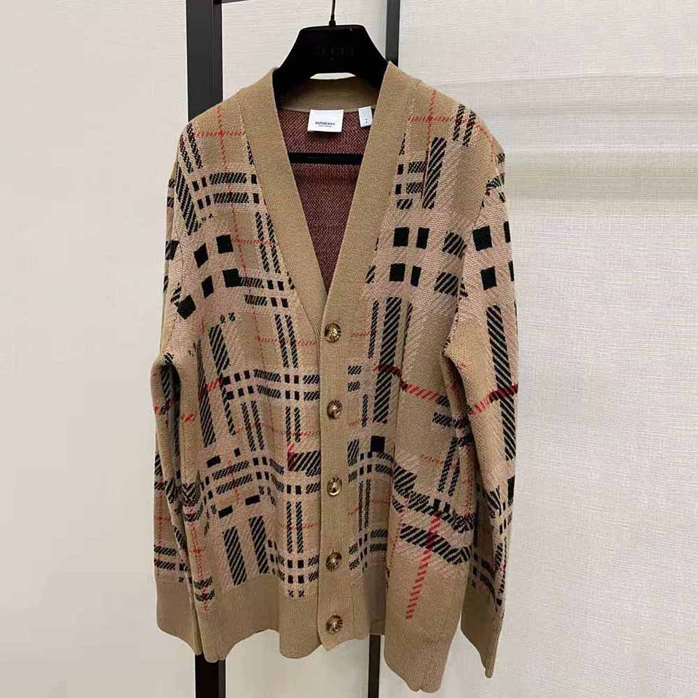 Close-up of jacquard check pattern on Burberry cardigan