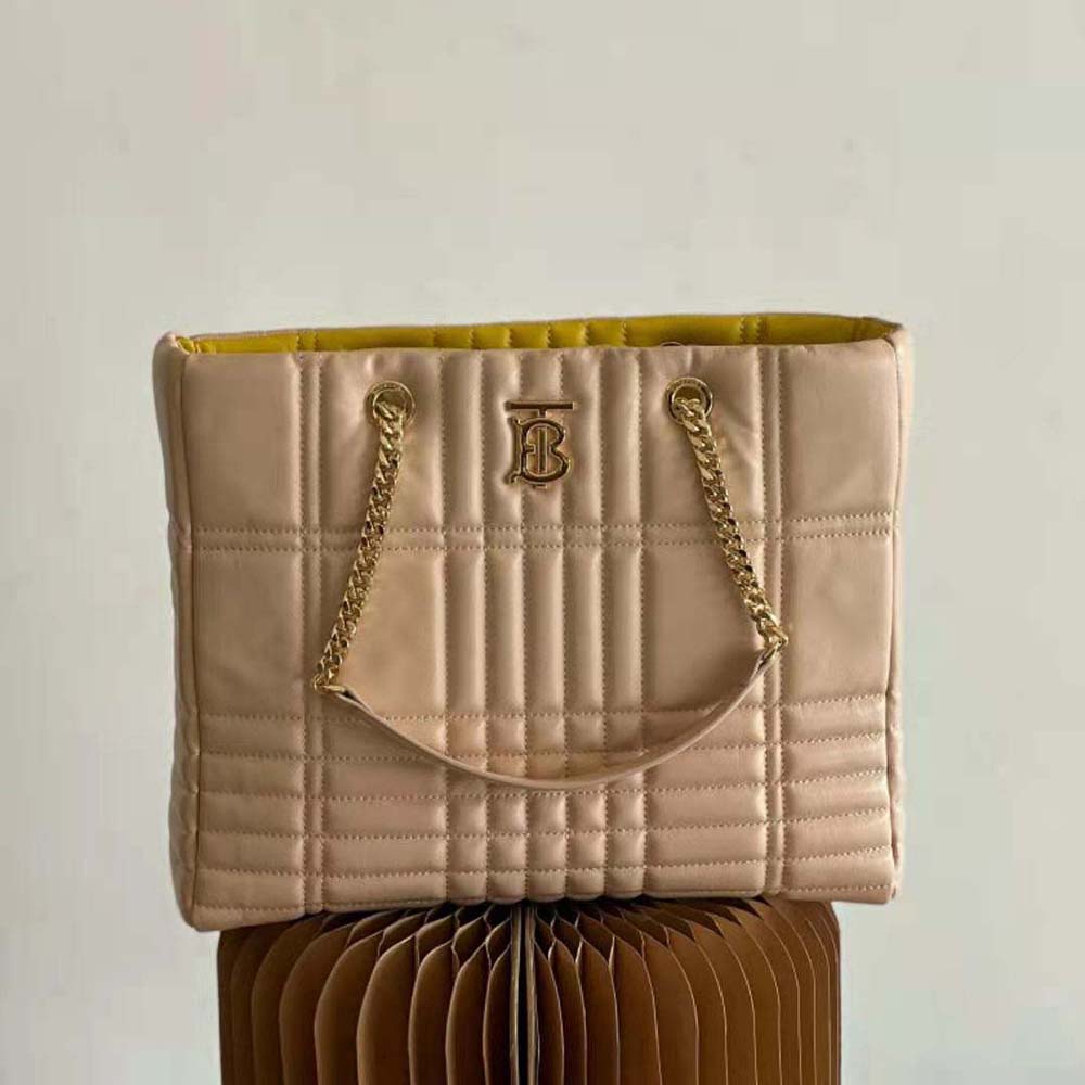 Close-up of quilted lambskin texture and gold clasp on Burberry Lola Shopper