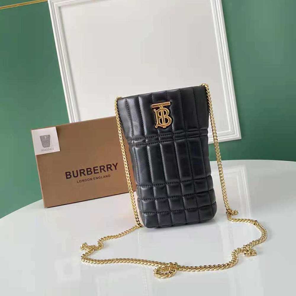 Close-up of gold-tone hardware on Burberry Micro Quilted Lambskin Lola Bucket Bag