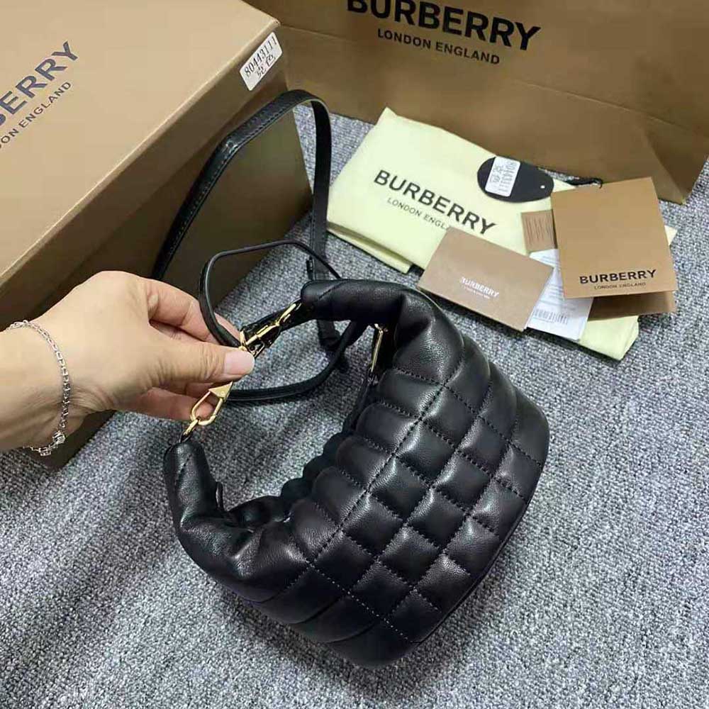 Side profile of Burberry Women Small Quilted Lambskin Crescent Lola Bag-Black