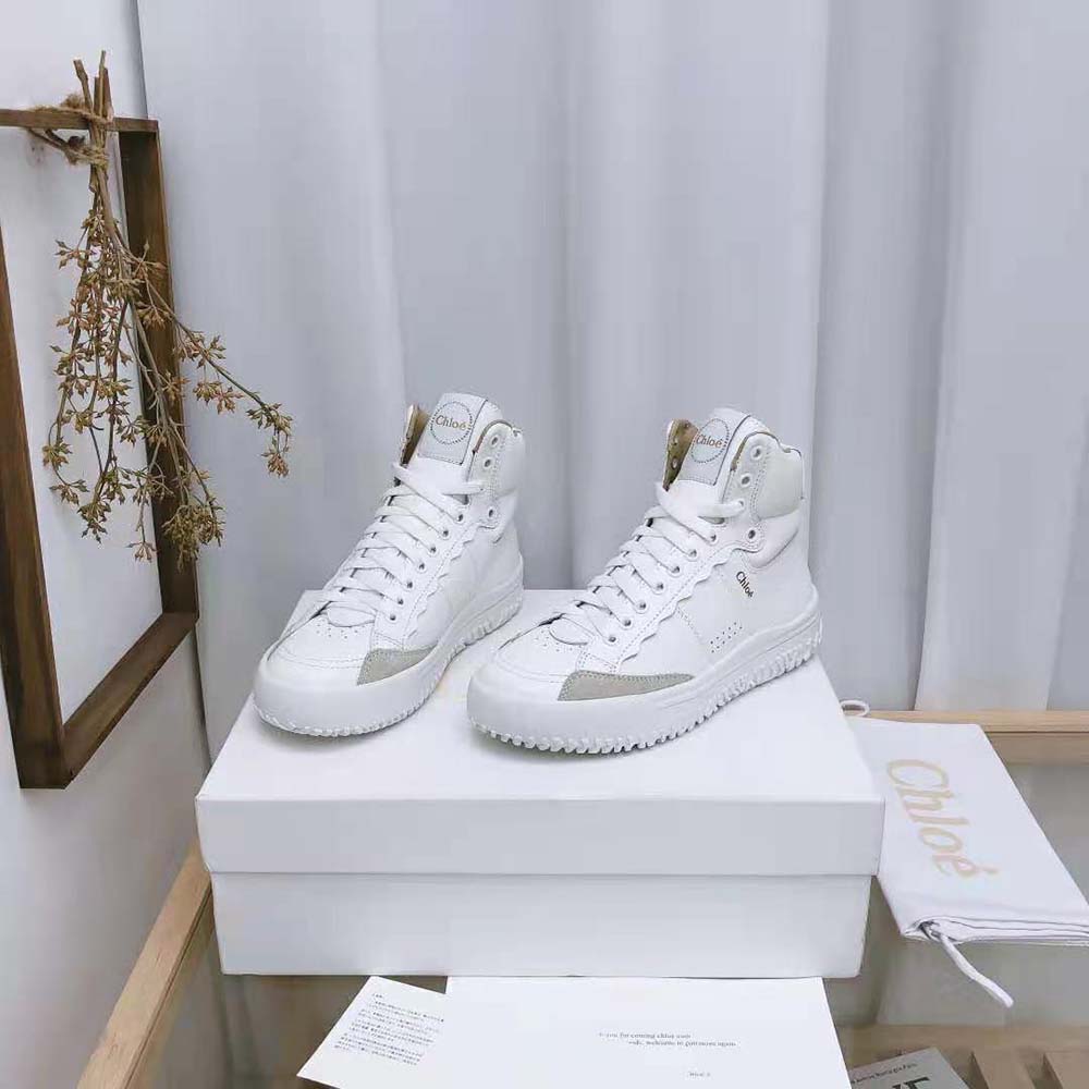 Top-down angle showing lace-up closure on Chloe Women Franckie High-Top Sneaker