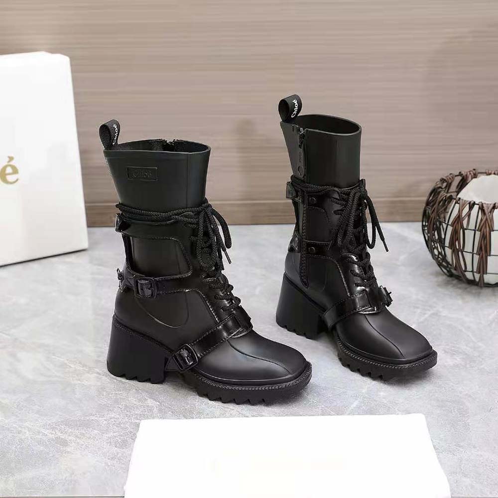 Top-down angle showing boot opening and glossy PVC material