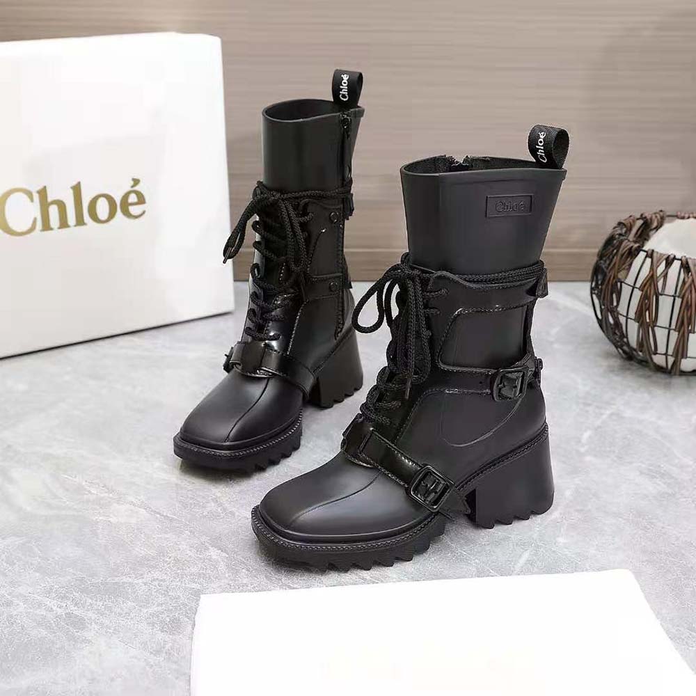 Close-up of harness strap and silver hardware on Betty Rain Boot