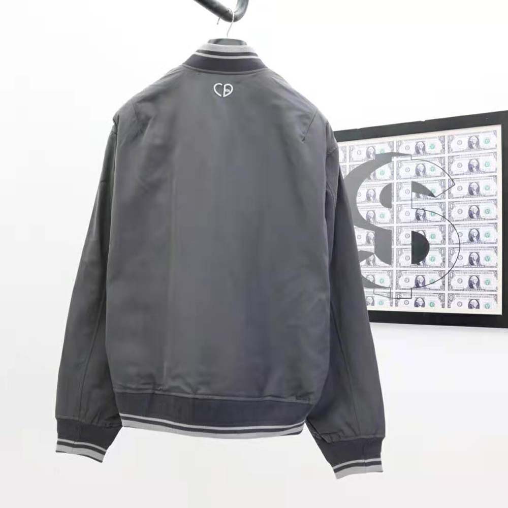 Side profile showing silhouette and structured shape of the Dior Men Teddy Blouson
