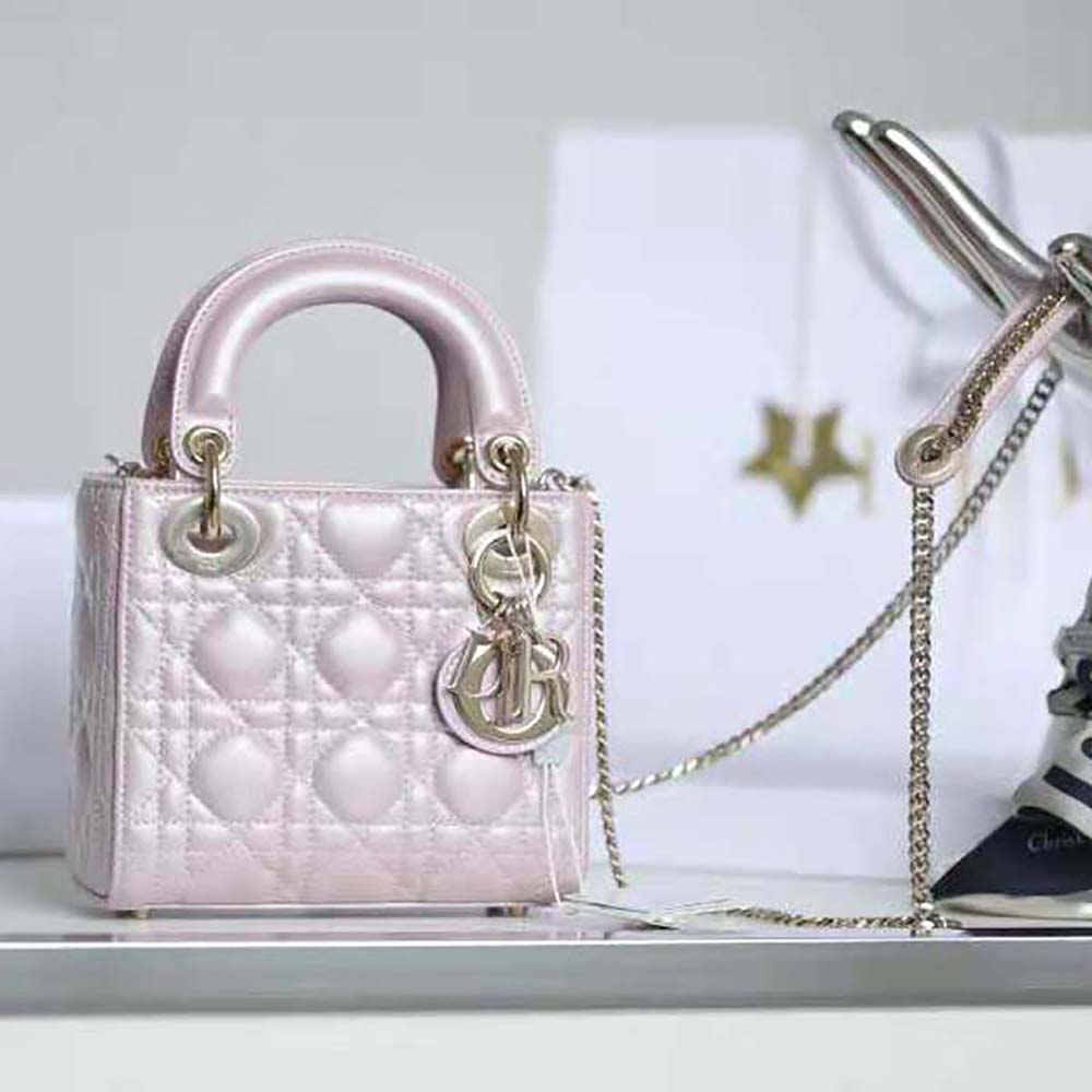 Close-up of cannage stitching and silver hardware on Dior Women Mini Lady Dior Bag