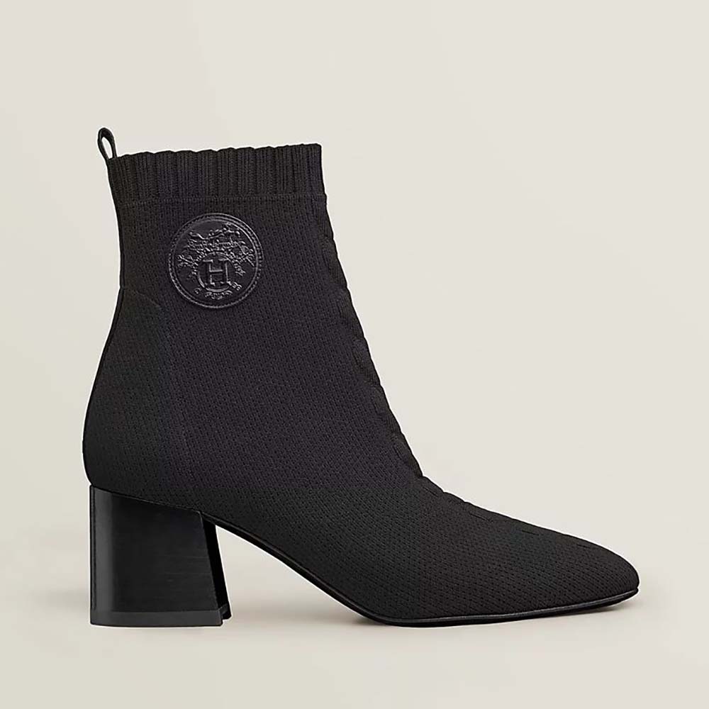 Side profile of Hermes Women Volver 60 Ankle Boot in black leather