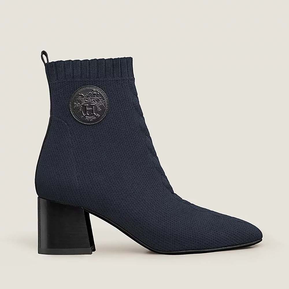 Side profile of Hermes Women Volver 60 Ankle Boot in navy leather