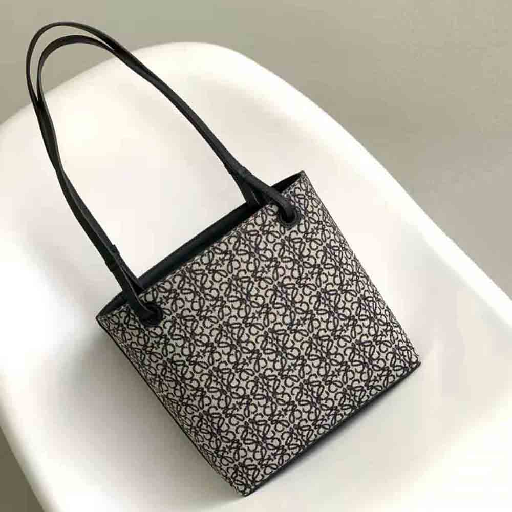 Side angle showing structured square silhouette and silver-tone hardware