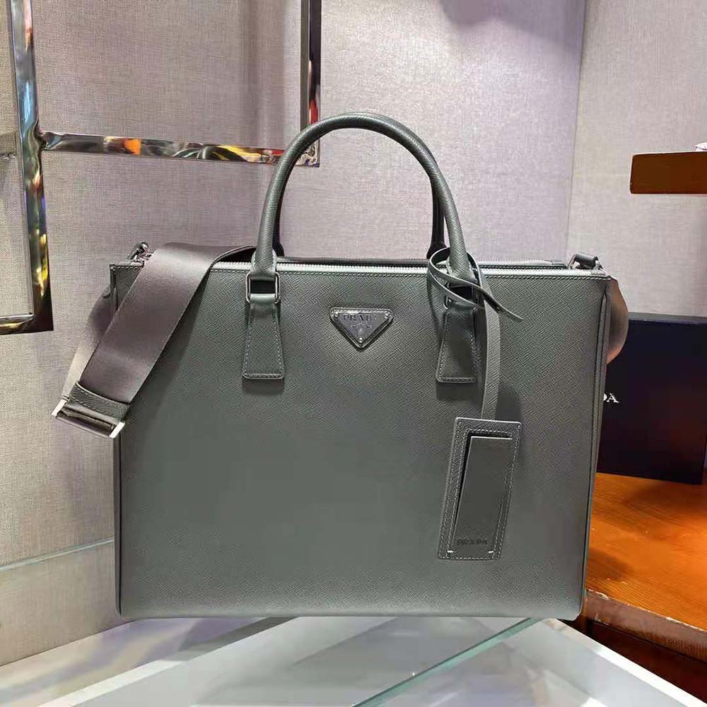 Side angle showing structured silhouette of Prada Men Saffiano Leather Prada Galleria Bag-Silver