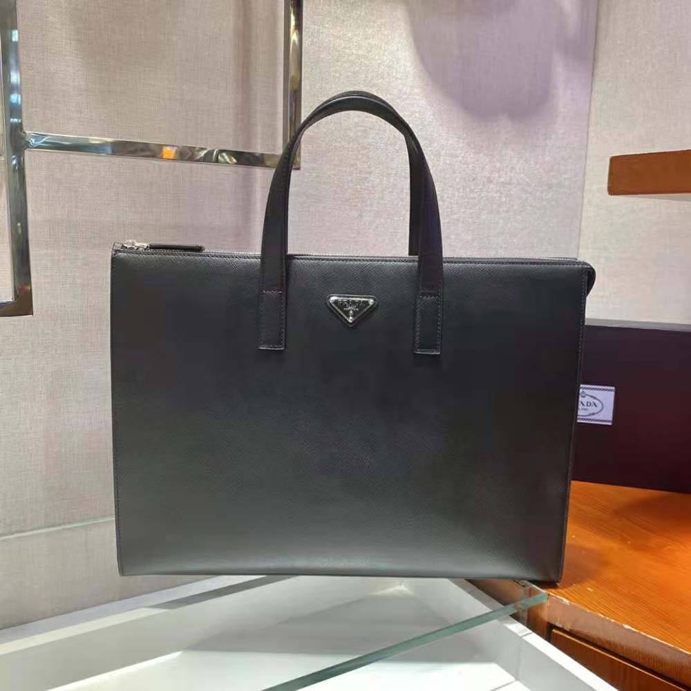 Side angle showing sleek silhouette of Prada Men Saffiano Leather Tote
