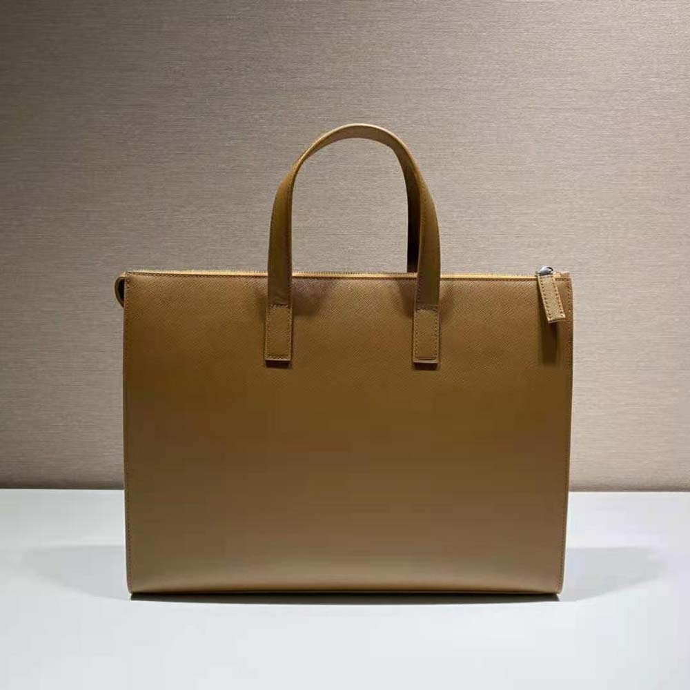 Side angle showing silver hardware on Prada Men Saffiano Leather Tote brown bag