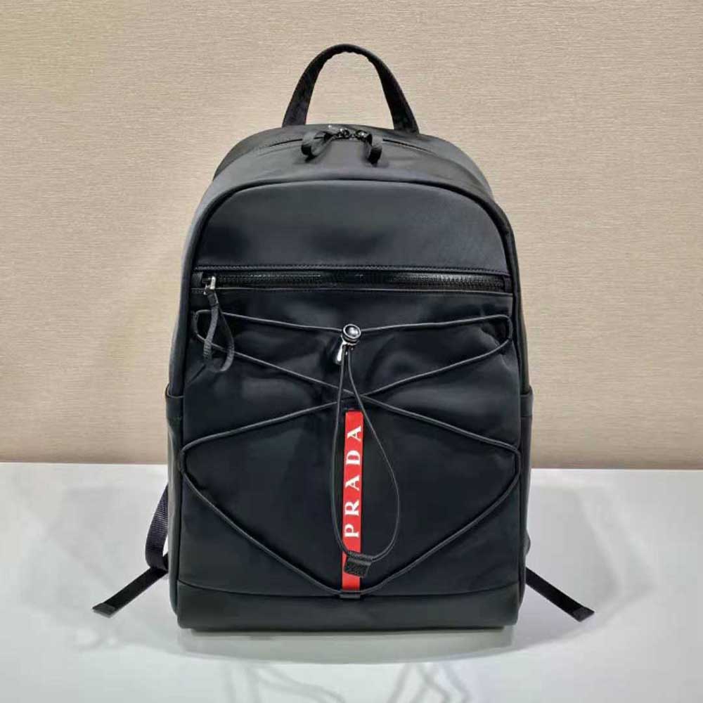 Close-up of polished metal hardware on Prada Men Technical Fabric Backpack