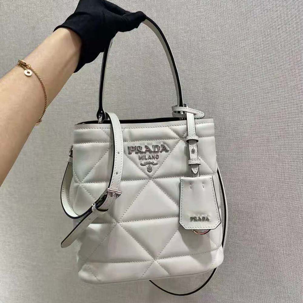 Close-up of silver hardware and drawstring on Prada Women Bucket Design Spectrum Leather Bag-White