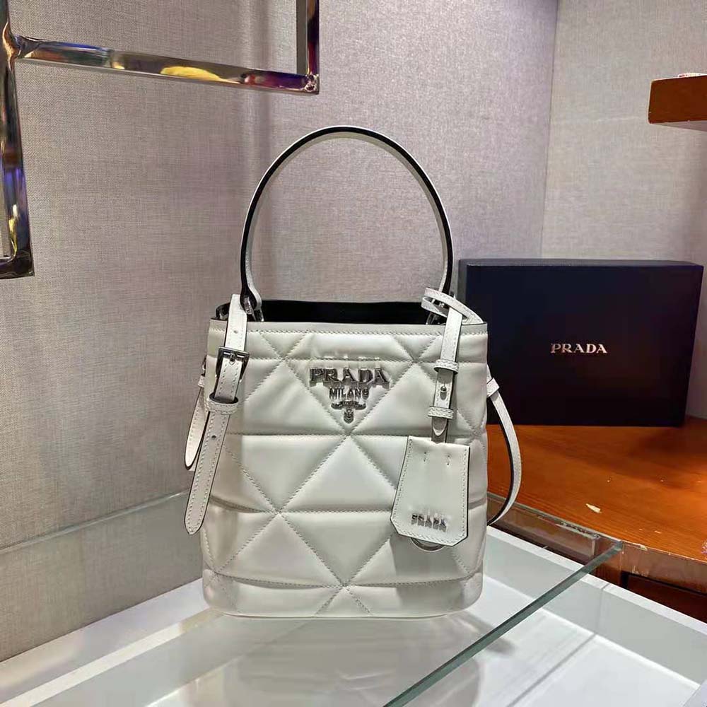 Side view showing silhouette of Prada Women Bucket Design Spectrum Leather Bag-White