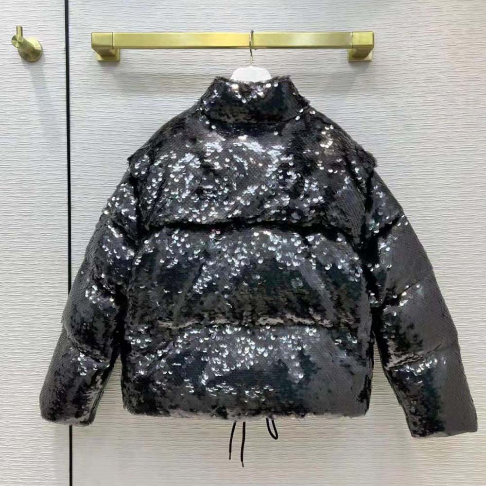 Side profile showing silhouette of Prada Women Convertible Sequined Re-Nylon Down Jacket-Black