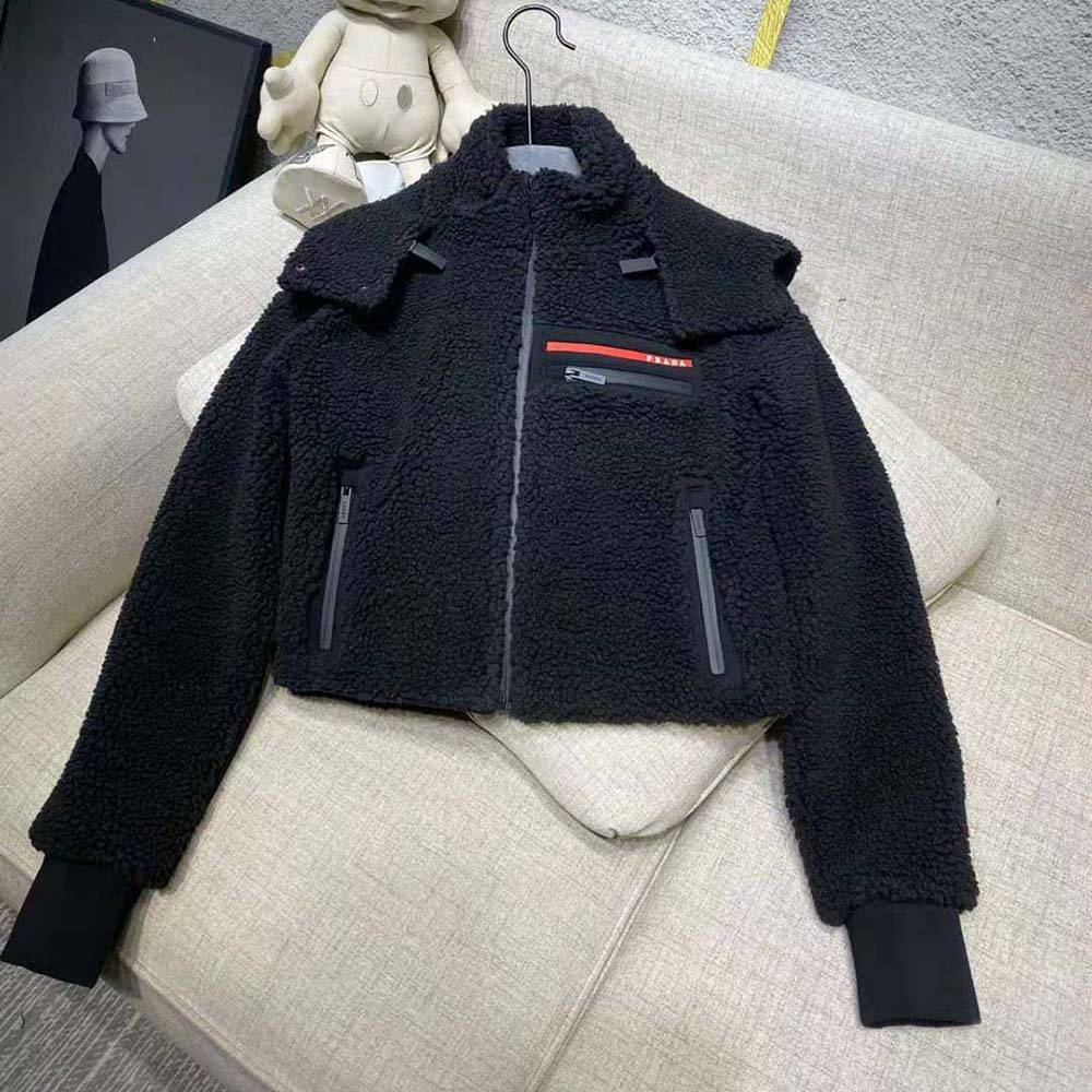 Side angle showing cropped silhouette of Prada Women Cropped Recycled Fleece Down Jacket-Black