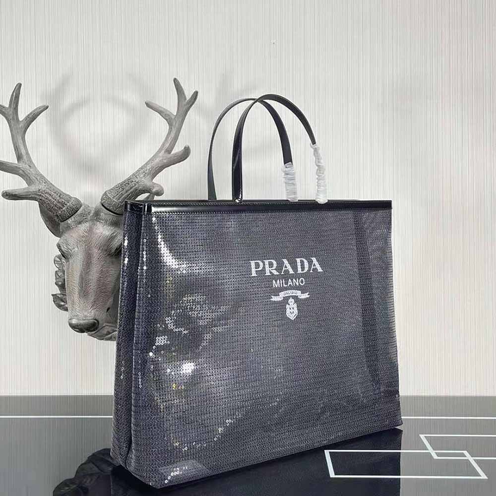 Side profile highlighting tote silhouette of Prada Women Sequined Mesh Tote Bag-Black