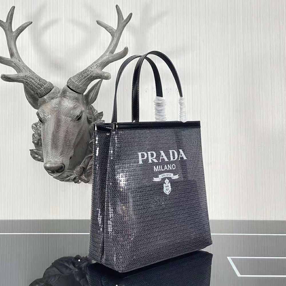 Side angle highlighting silhouette and zipper of Prada Women Small Sequined Mesh Tote Bag-Black