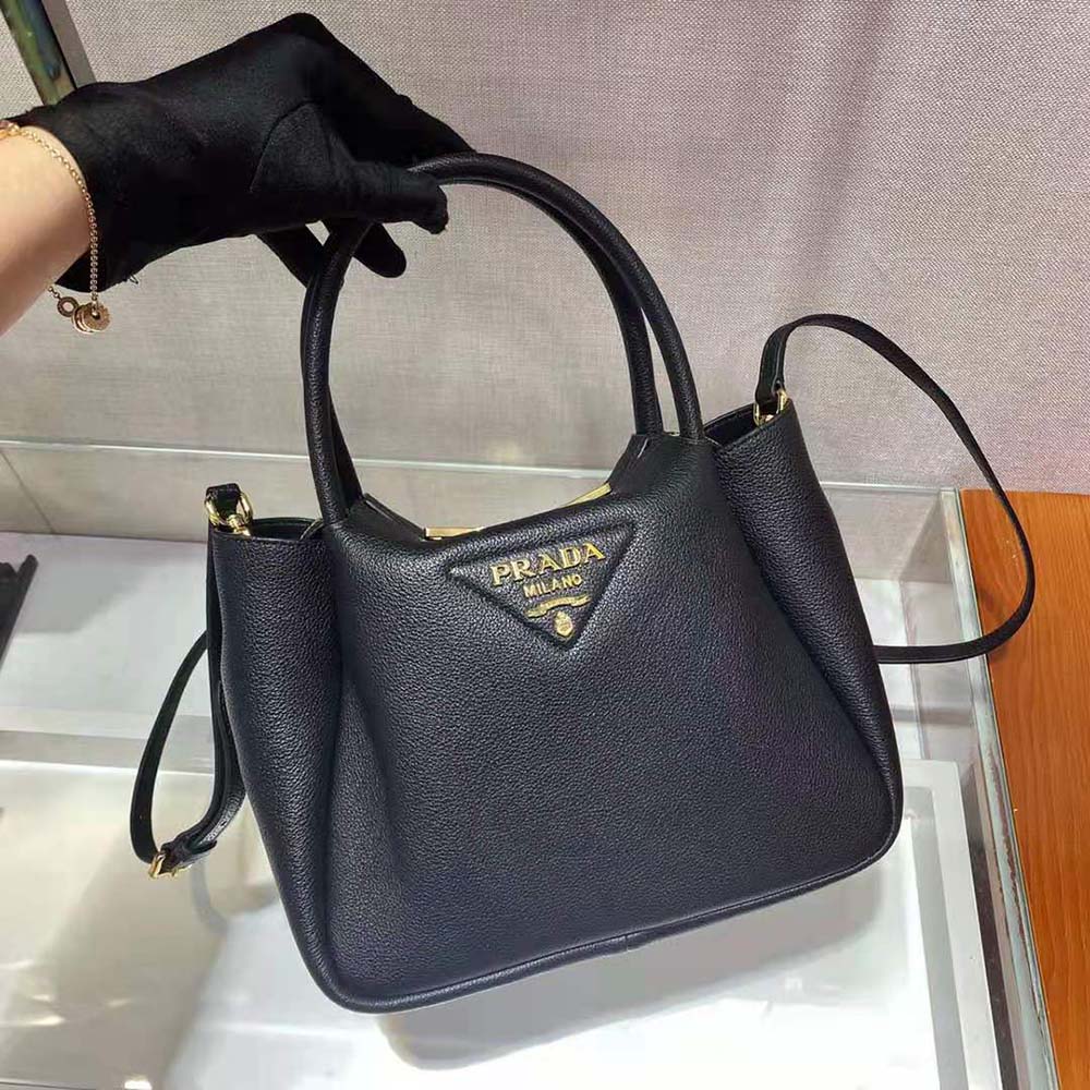 Prada Women Small leather Handbag with the Prada Metal Lettering Logo Illuminating Its Center - image 4
