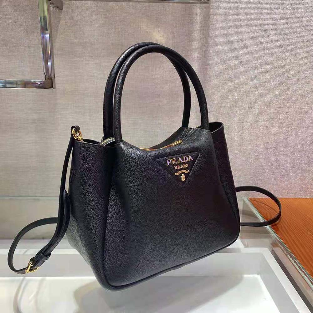 Prada Women Small leather Handbag with the Prada Metal Lettering Logo Illuminating Its Center - image 5