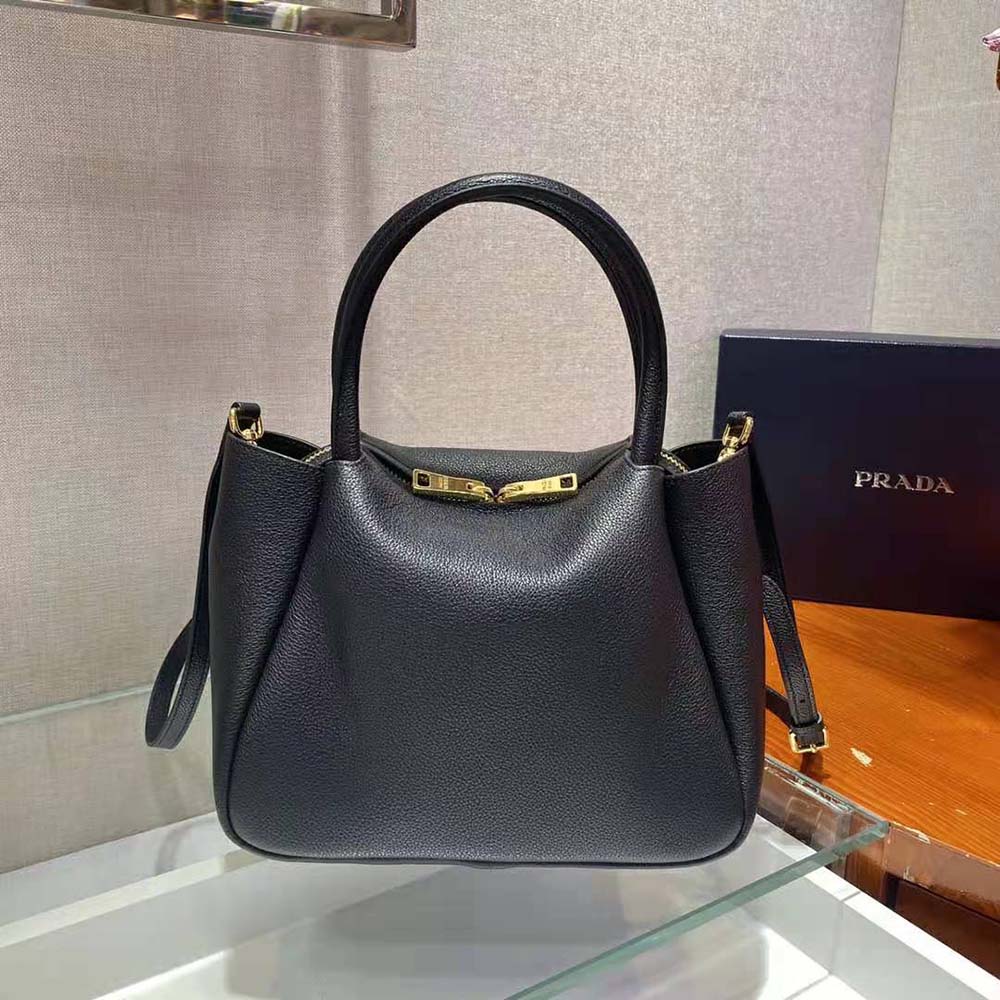 Prada Women Small leather Handbag with the Prada Metal Lettering Logo Illuminating Its Center - image 6