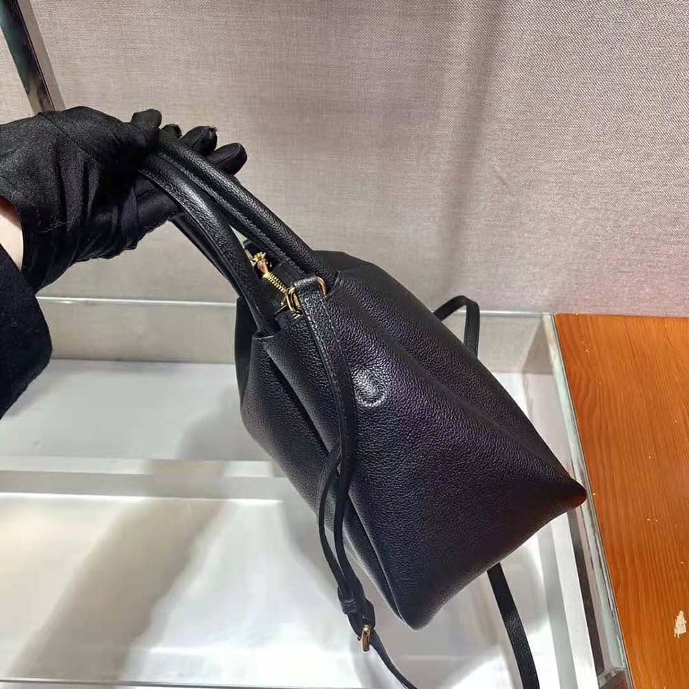 Prada Women Small leather Handbag with the Prada Metal Lettering Logo Illuminating Its Center - image 8