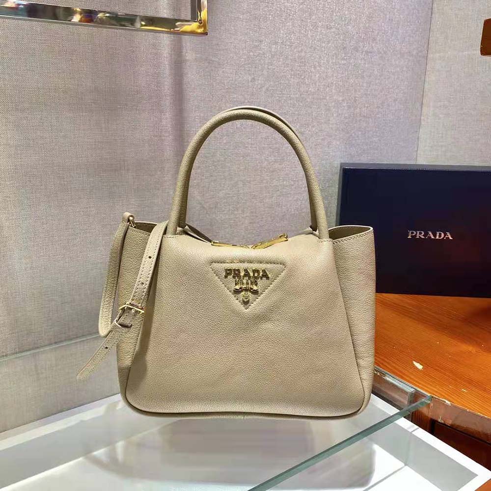 Side angle showing silhouette of Prada Women Small leather Handbag Sandy
