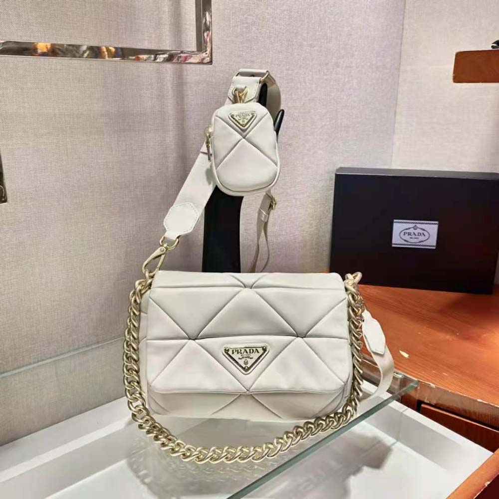 Close-up of silver-tone closure on Prada Women System Nappa Leather Patchwork Bag-White