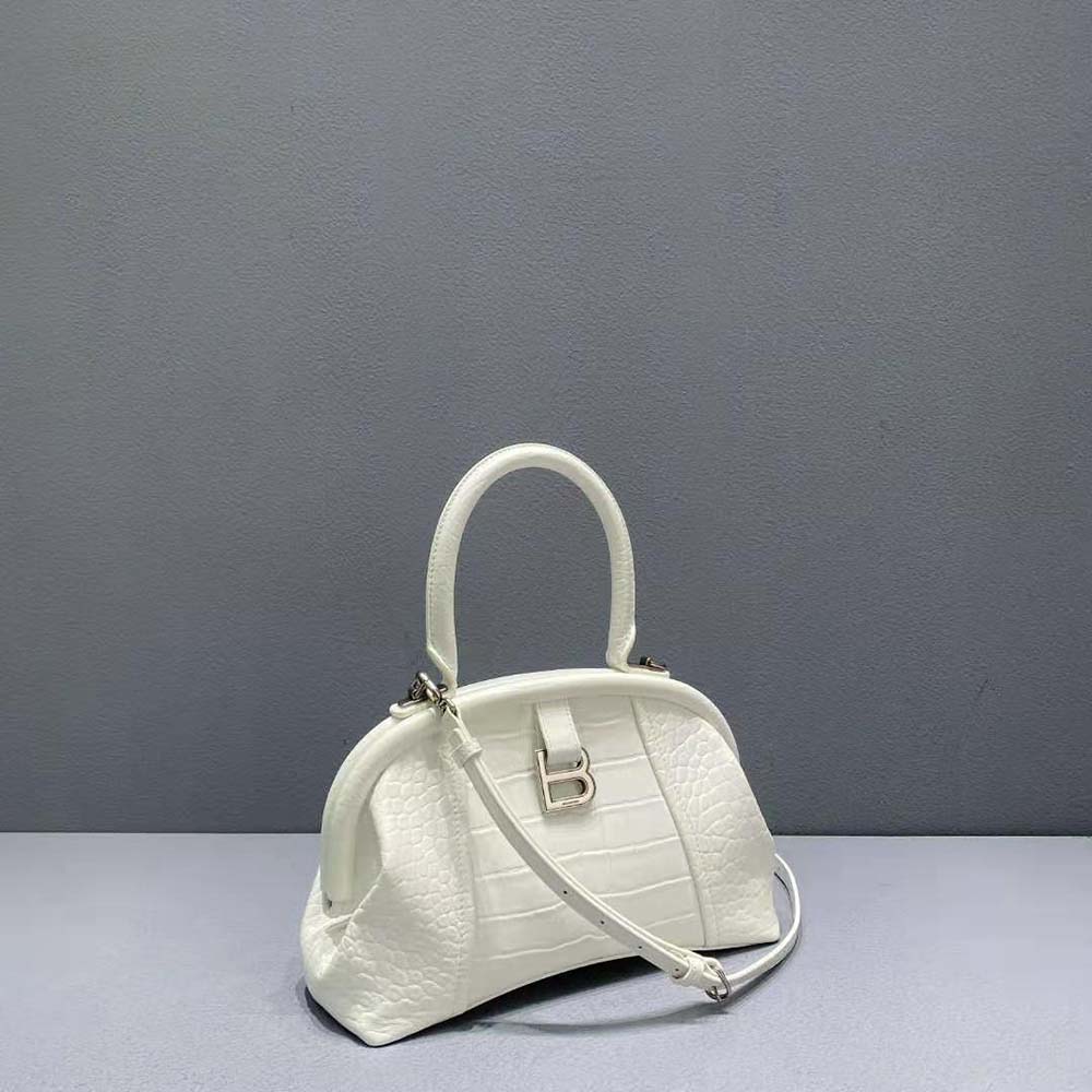 Side angle showing silhouette of Balenciaga Women Editor Small Bag white