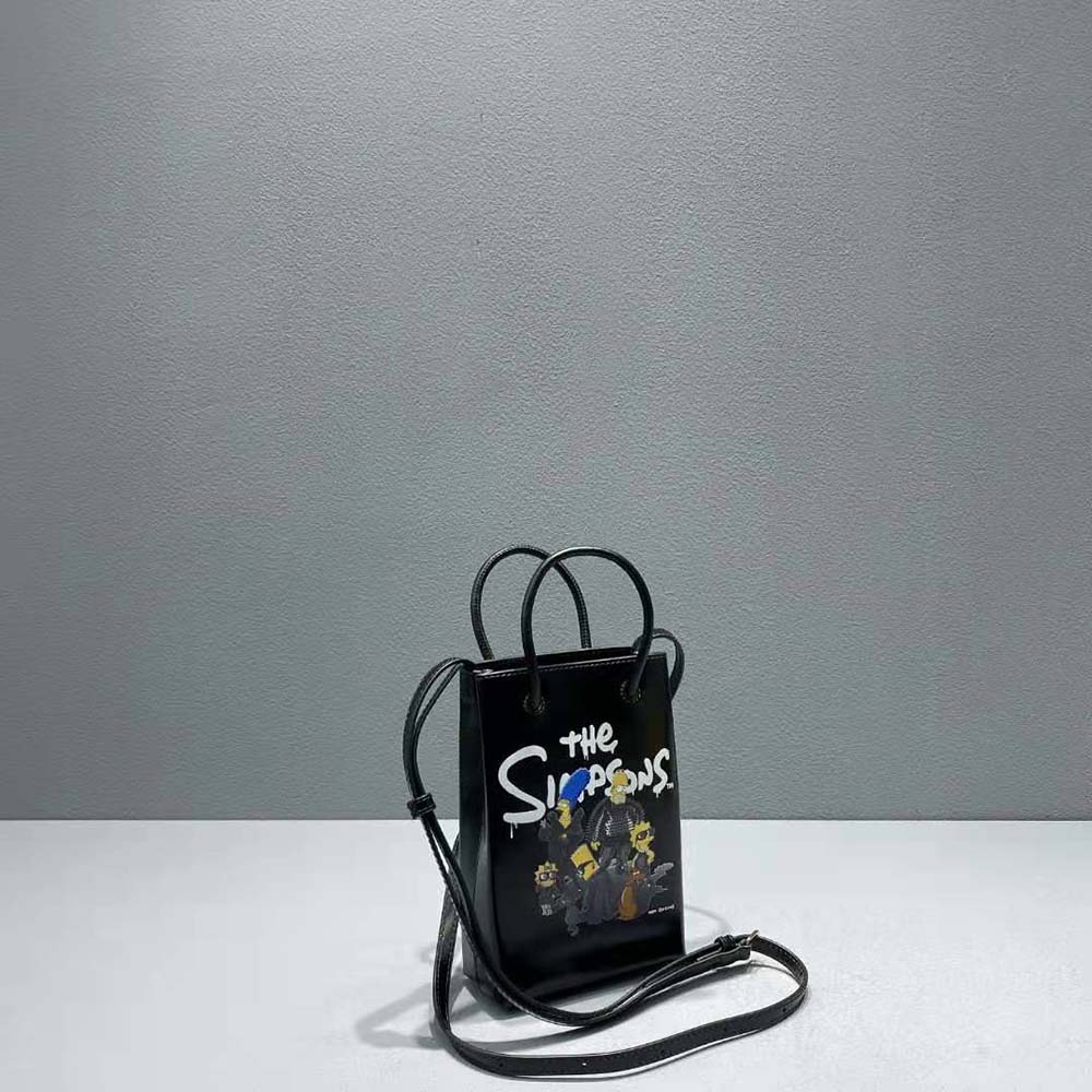Side angle showcasing silhouette of Balenciaga Women the Simpsons Tm 20th Television Mini Shopping Bag