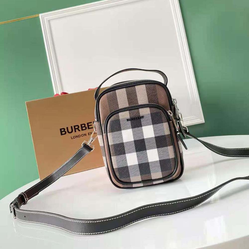 Close-up of Burberry check pattern and leather trim details